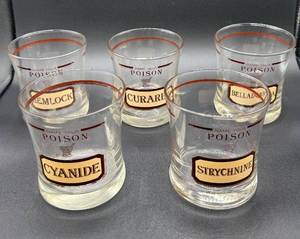 lot 45 image: Vintage Cera Neiman Marcus Name Your Poison Set of 5 Barware SetWhiskey Glasses 22kt Trim