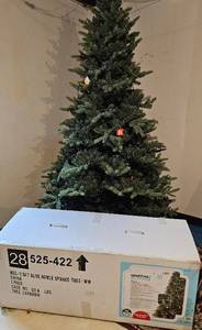 lot 128 image: Martha Stewart Living 7.5 ft pre-lit Blue Noble Spruce LED Tree