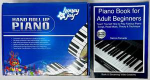 lot 204 image: Honey Joy Hand Roll Up Piano and Piano Book for Adult Beginners