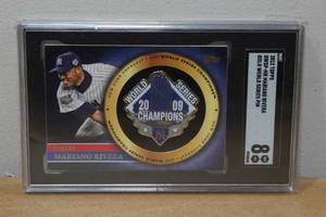 lot 27 image: 2012 Topps Mariano Rivera Gold World Series Pin Baseball Card - SGC 8