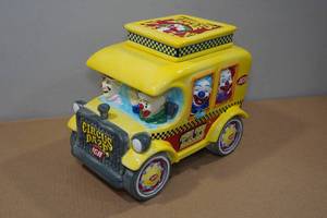lot 104 image: IGA Circus Daze Clown Taxi Ceramic Cookie Jar