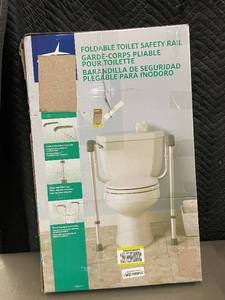lot 6 image: Foldable Toilet Safety Rail with Comfort Grip Armrests