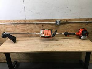 lot 32 image: ECHO 25.4 cc Gas 2-Stroke Straight Shaft String Trimmer Model # SRM-266