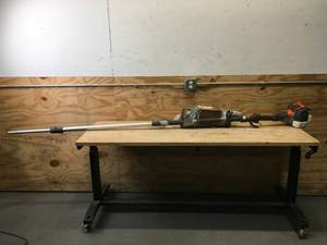 lot 66 image: Non-Working Husqvarna Pole Saw Model # 525PT5S