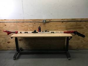lot 22 image: Toro 60V MAX 10 Brushless Pole Saw with 2.0Ah Battery and Charger Model # 51870