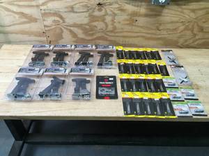 lot 139 image: Lot of Rubber Hood Catches, Replacement Blades and Grease Gun Accessories