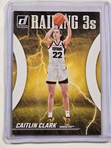 lot 53 image: Caitlin Clark Rookie Insert 2024 Panini Donruss Raining 3s No. R1