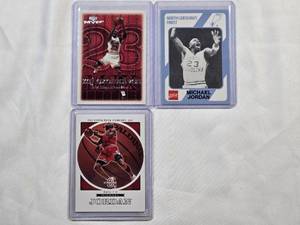 lot 133 image: Lot of 3 Michael Jordan Cards - Coca-Cola, Upper Deck Standing 8, Upper Deck MJX