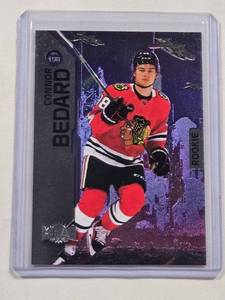 lot 215 image: Connor Bedard Rookie 2023-24 Metal Universe No. 198