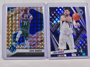 lot 234 image: Lot of 2 Luka Doncic Panini Cards - Phoenix No. 157, Mosaic Prizm No. 47