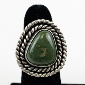 lot 39 image: Unmarked (Navajo) Green Turquoise With Rope Boarder Sterling Silver Statement Ring . Size 7.5 - 7.75.