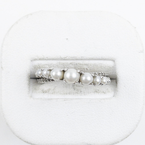 lot 93 image: Bazar Group  Twisted  CZ & Pearl Sterling Silver Ring. Size 7 - 7.25.