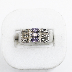 lot 108 image: Three Stone Marquise Cut Amethyst & Marcasite Sterling Silver Ring. Size 9.5 - 9.75.