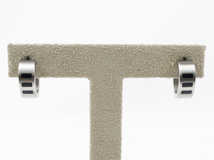 lot 117 image: TeNo Mens Polished Titanium Half-Hoop Pierced Earrings. Estimated Replacement Value $300