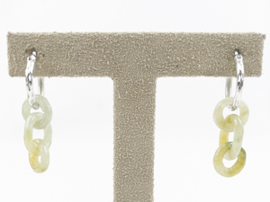 lot 137 image: Three Carved Jade Link Sterling Silver Hinged Wire Hoop Earrings.