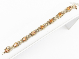 lot 140 image: Oval Cut Orange Stone Filigree Vermeil (Sterling Silver) Tennis Bracelet.