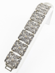 lot 168 image: Repousse Style Two Tone Base Metal Panel Bracelet.