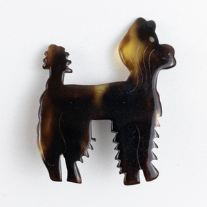 lot 200 image: Tortoise Shell Base Metal Poodle Dog Brooch.