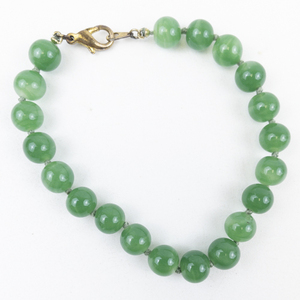 lot 243 image: Green Aventurine Gold Tone Base Metal Bead Bracelet . New Old Stock
