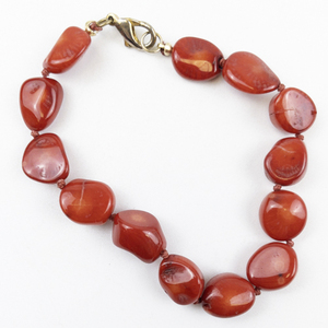 lot 246 image: Knotted Red Coral Stretch Bead Bracelet . New Old Stock