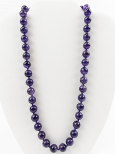 lot 254 image: Round Polished Ameythst Gold Tone Base Metal Bead Necklace. New Old Stock