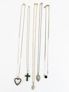 lot 270 image: Group of 5  Gold Tone Base Metal Pendant Necklaces .