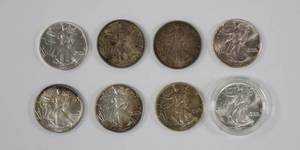 lot 39 image: American Silver Eagles Lot of 8 Better Dates