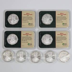 lot 32 image: American Silver Eagle Lot of 9