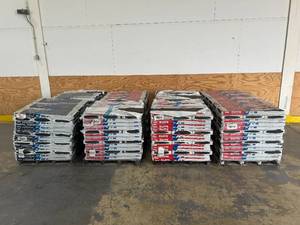TAMKO- 252 Bundles of- Elite Glass-Seal Rustic Hickory 3-Tab Roofing Shingles (33.31 sq. ft. Per Bundle) and 84 Bundles of- Hip and Ridge Oxford Grey Hip and Ridge Cap Roofing Shingles (33.3 lin. ft. Per Bundle)- Retail value of $13,598.76