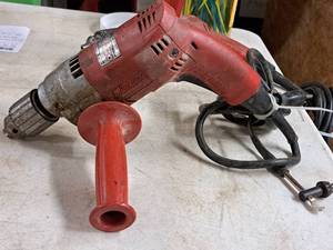 lot 569 image: Milwaukee Magnum Holeshooter Drill with Red Handle