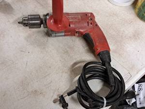lot 570 image: Milwaukee Magnum Holeshooter Drill with Red Handle