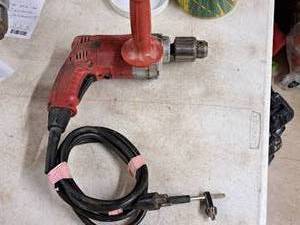 lot 571 image: Milwaukee Magnum Holeshooter Drill with Red Handle