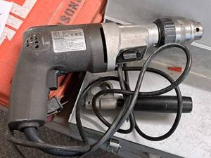 lot 583 image: Black & Decker Screamer 12 VSR Hammer Drill 5072 with Black Side Handle and Metal Case