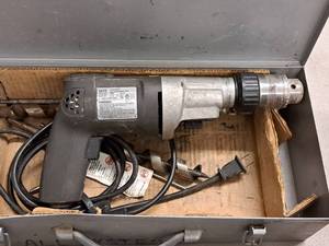 lot 584 image: Black & Decker Screamer 12 VSR Hammer Drill 5072 with Metal Case and Drill Bits
