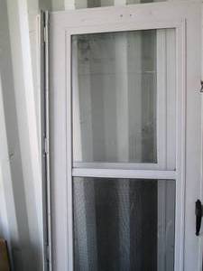 lot 39 image: Pair of 32in Screen Storm doors wit...