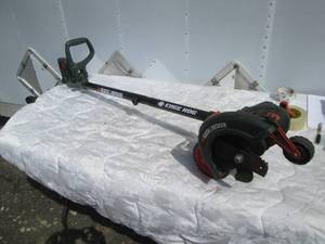 lot 105 image: Black and Decker Electric lawn edge...