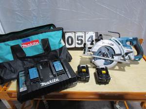 lot 54 image: Makita Magnesium Saw Kit