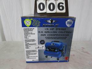 lot 6 image: Eagle Silent Series 4 Gallon Air Compressor