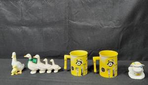 lot 32 image: Set of 2 Ceramic Ducks, 2 Novelty Yellow Mugs, and 1980 Frog Ceramic Fragrance Dispenser