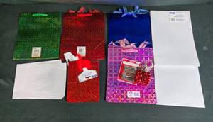 lot 56 image: Set of Holiday Gift Bags with Ornament Hooks and Decorative Bells