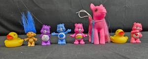 lot 65 image: Collection of Assorted Toys Care Bears, Troll, Rubber Ducks, and Pony