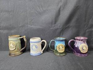 lot 73 image: Collection of Festival-Themed Stoneware and Pewter Mugs