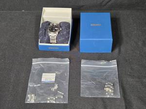 lot 104 image: Seiko Mens Solar Watch Model SKX173 with Extra Links in Orig Box