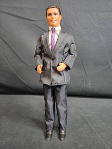 lot 105 image: Totally Cool Ken Doll with Black Suit and Purple Tie - Mattel 1997
