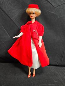 lot 106 image: Vintage Silken Flame Barbie Doll in Red Velvet Coat and Hat