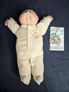 lot 107 image: Cabbage Patch Kids Doll with Original Birth Certificate and Tag