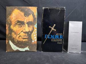 lot 116 image: Set of Avon President Lincoln, Excalibur Cologne, and Calvin Klein Contradiction