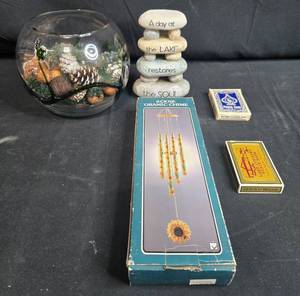 lot 132 image: Decorative Lot with Wind Chime, Glass Bowl, Stone Decor, and Playing Cards