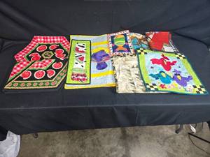 lot 133 image: Set of Colorful Quilted Items Inc Aprons & Fabric Pan Carrier