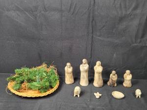lot 145 image: Handcrafted Ceramic Nativity Set with Wicker Basket and Greenery